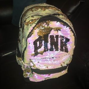 VS PINK backpack with laptop compartment in back.